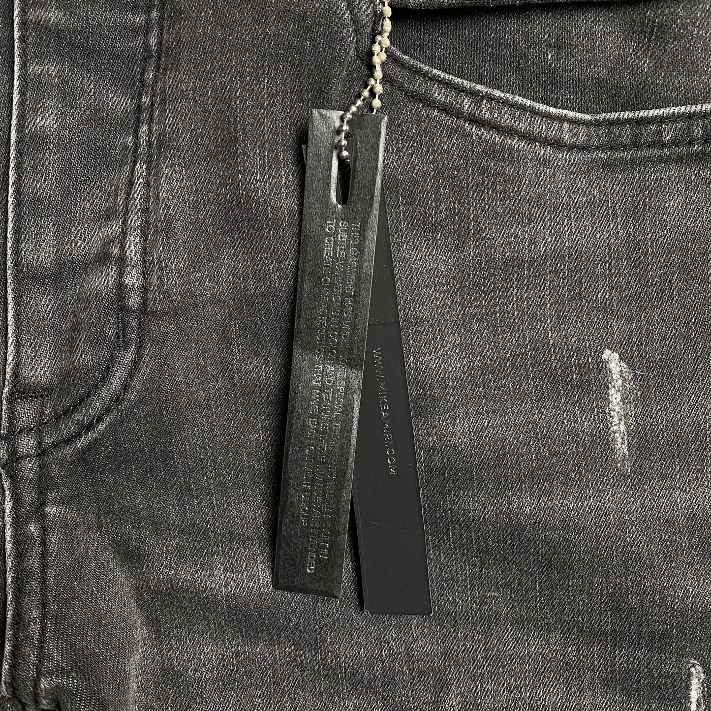 AMIRI SLASH SLIM JEANS